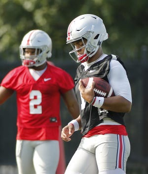 Ohio State's Justin Fields has the physical talent to be a top quarterback, but he also has the competitiveness, said offensive tackle Branden Bowen. [Adam Cairns/Dispatch]
