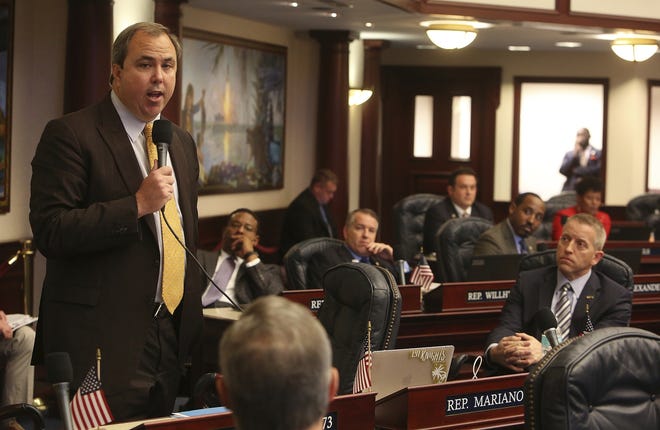 State Rep. Joe Gruters, R- Sarasota, (left) speaks on the House floor in Tallahassee in this 2017 file photo. {SCOTT KEELER/TAMPA BAY TIIMES]