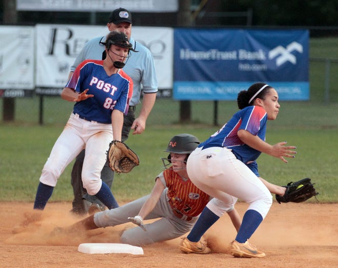 Mallory Haynes for Shelby Post 82 is late with the tag of Ivy Ray as they played Davidson Post 8 in the NC American Legion Lady Fastpitch State Championship finals Monday evening at Cleveland Community COllege in Shelby. [Mike Hensdill/The Gaston Gazette]