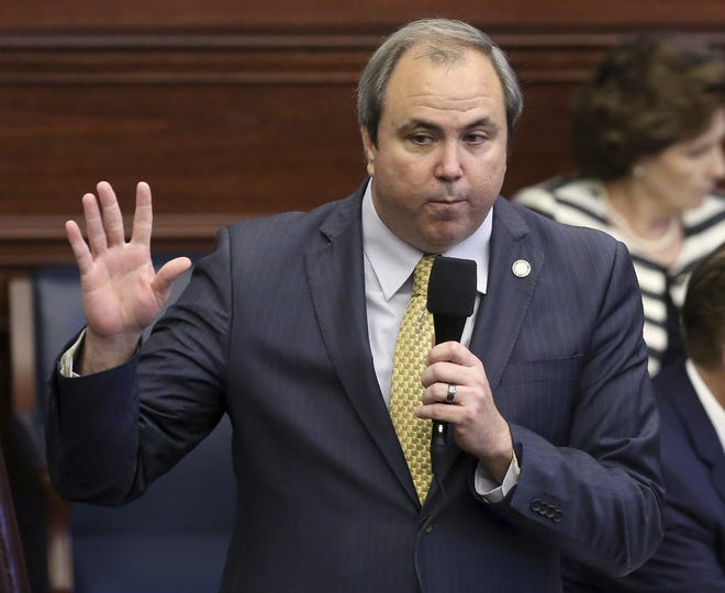 Sen. Joe Gruters, R-Sarasota, answers questions on an immigration bill during session Thursday May 2, 2019, in Tallahassee. With emotions running high after a Texas mass shooting that targeted Latinos, Gruters decided to delay an upcoming immigration listening tour. [AP PHOTO / STEVE CANNON]