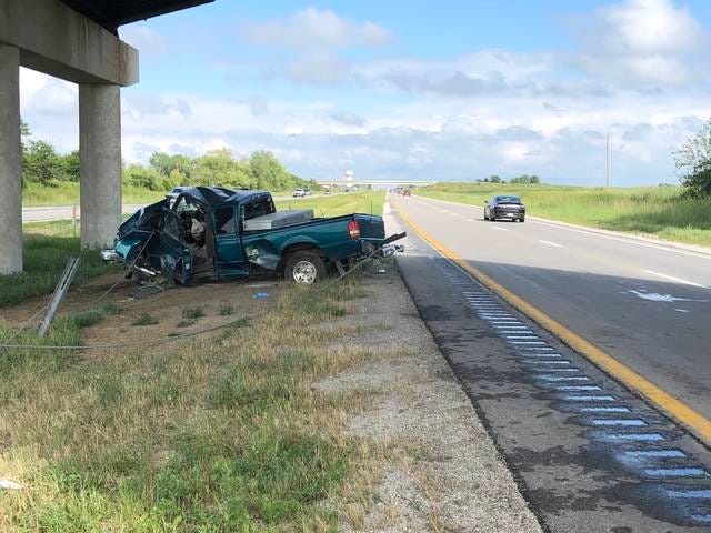 Green pick up truck on the side of U.S. 30 facing east, outside of Ames, Monday afternoon | Photo by Logan Kahler, Boone News-Republican