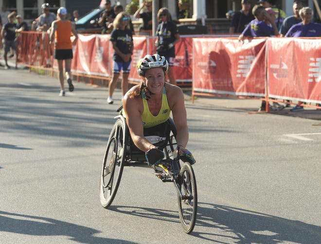 Tatyana McFadden, defending champion and course record holder, heads to the starting line for the 2017 Falmouth Road Race. [Merrily Cassidy/Cape Cod Times]