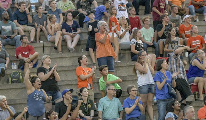 Fans cheer the Yellow Jackets at a Kickoff Classic game between Leesburg and Inverness Citrus on Aug. 17, 2018, at Leesburg High School. Fans are the lifeblood on high school sports teams. [PAUL RYAN / CORRESPONDENT]