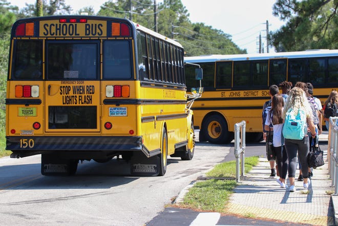 St. Augustine High students walk home after class on Tuesday, August 13, 2019. Earlier in the day the St. Johns County School District announced a student enrollment of 36,919, a 6 % increase from the 2018-19 academic year. St. Augustine High's first day tally was 1,563 students. [Will Brown/ The Record]