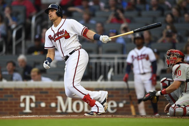 The Braves' Austin Riley watches his home run during a game against the Philadelphia Phillies on June 15 in Atlanta. [AP FILE PHOTO]