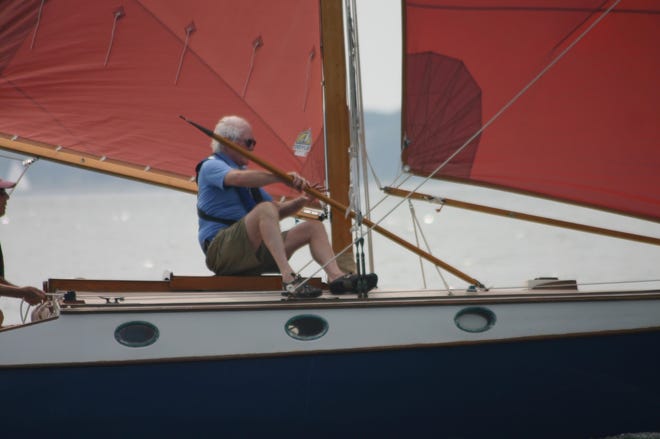 Skipper Tom Kenney grabs the whisker pole aboard Windfall during the 2016 Stone Horse Regatta. Kenney passed away earlier this year and the Stone Horse Regatta was not held in 2019. [BARBARA VENERI/STANDARD-TIMES SPECIAL/SCMG]