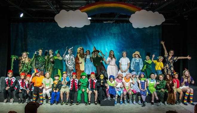 The cast of Emerald Coast Theatre Co.'s production of "The Wizard of Oz" takes a curtain call. [NIKKI HEDRICK/CONTRIBUTED PHOTO]