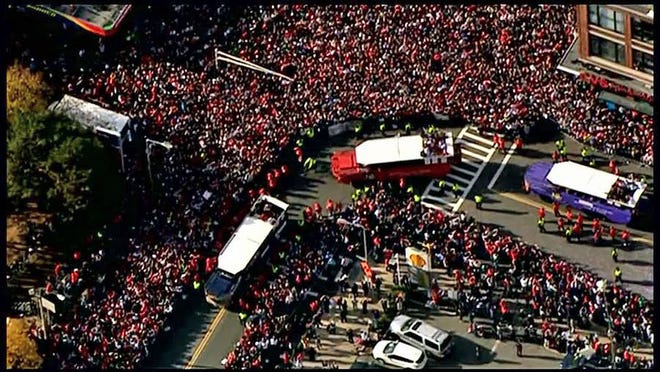 Fans pack the route to see the Red Sox during the 2013 celebration of their World Series championship. It doesn’t appear there will be any celebration for this year’s underperforming team.