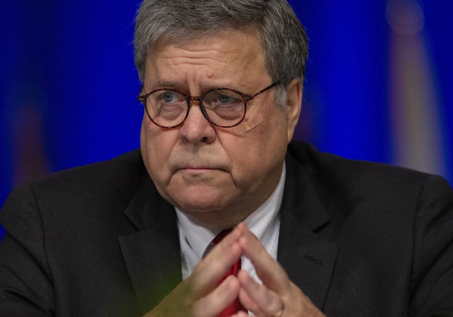 United States Attorney General William Barr listens to New Orleans Mayor LaToya Cantrell during the Grand Lodge Fraternal Order of Police's 64th National Biennial Conference in New Orleans, Aug. 12. [DAVID GRUNFELD/THE ADVOCATE via AP]
