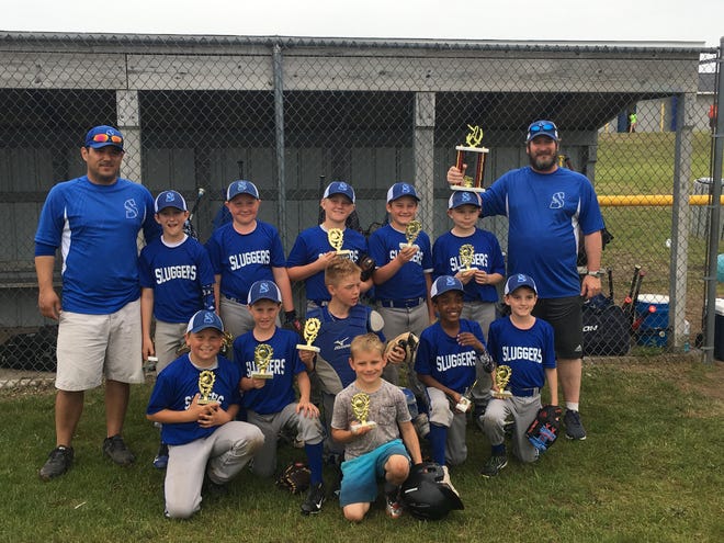 The Sluggers won the Kingsley tournament, and finished second in tourneys at Escanaba and Gaylord this summer. [Photos courtesy of Marc Andrezejak]