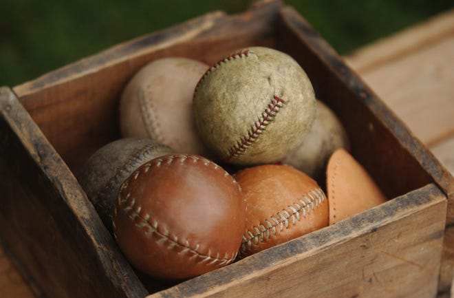 Handmade baseballs are stored in a box at Stan Hywet Hall & Gardens for a vintage baseball game. [Beacon Journal/Ohio.com file photo]