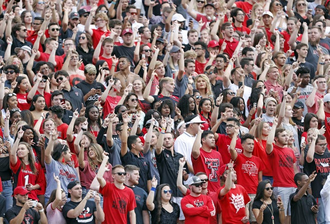 Texas Tech fans stand before a nonconference game Sept. 8, 2018 against Lamar at Jones AT&T Stadium. Texas Tech is scheduled open the 2021 season by hosting FIU in a Thursday night game. With the agreement, Tech and Lamar agreed to rescind a game contract they had in place for Sept. 4, 2021. [Brad Tollefson/A-J Media]