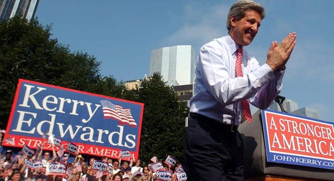 FILE PHOTO: Then-Democratic presidential candidate Sen. John Kerry, D-Mass., thanks the crowd after a campaign rally in downtown Pittsburgh on July 6, 2004.