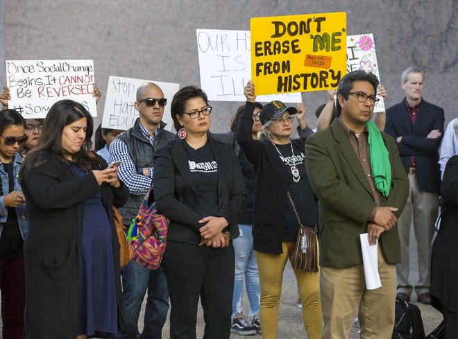People rally in front of the State Board of Education building in Austin before a preliminary vote on whether to create a statewide Mexican American studies course on April 11, 2018. [RICARDO B. BRAZZIELL / AMERICAN-STATESMAN]