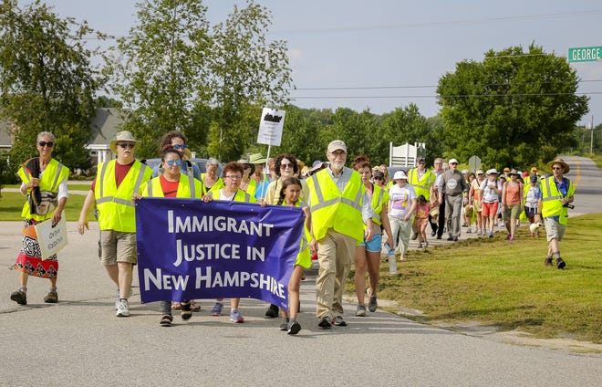 Walkers arrive at the Strafford County Jail during the Solidarity Walk for Immigrant Justice in 2018. The 2019 walk is being held this week. [Shawn St. Hilaire/Fosters.com, file]