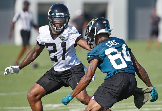 A.J. Bouye of the Jaguars defends Keelan Cole during a recent training camp practice. Bouye and other defensive starters will ge their first action of the preseason on Thursday at Miami. [Bob Self/Florida Times-Union]