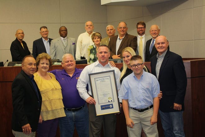 Front row, left to right – President Kenny Matassa, Sheryl Williams, Gerald Williams, Jason Williams, Christine Williams, Preston Williams, and Councilman Randy Clouatre. Back row, left to right – Council members Oliver Joseph, Bill Dawson, Travis Turner, Daniel Satterlee, Teri Casso, Benny Johnson, Todd Lambert, Aaron Lawler, and John Cagnolatti.