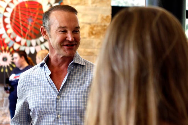 Shawn Terry, a Democratic candidate for the state legislature in Texas, meets with supporters during a campaign event in Dallas on Saturday. Terry has already raised $235,000 as Democratic donors pour money into legislative races nationwide in hopes of flipping statehouse chambers in 2020.