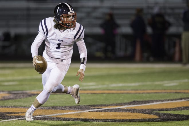 Belvidere North's Holden Paddock, who also is a star baseball player, didn't throw often as a junior but says he can throw a little more as a senior in the Blue Thunder's option offense. [SCOTT P. YATES/RRSTAR.COM STAFF]