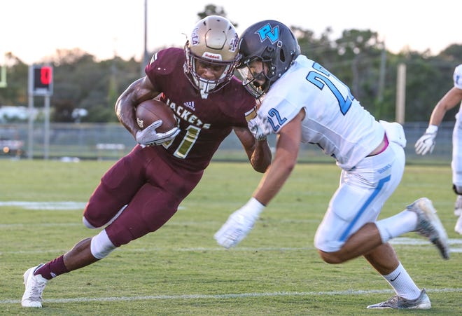 St. Augustine's Jaden McDowell (11) is tackled after a catch by Ponte Vedra defensive back Christian DeSanto (22) during the first half of a Sept. 7, 2018 football game. [Gary Lloyd McCullough/For The Record]