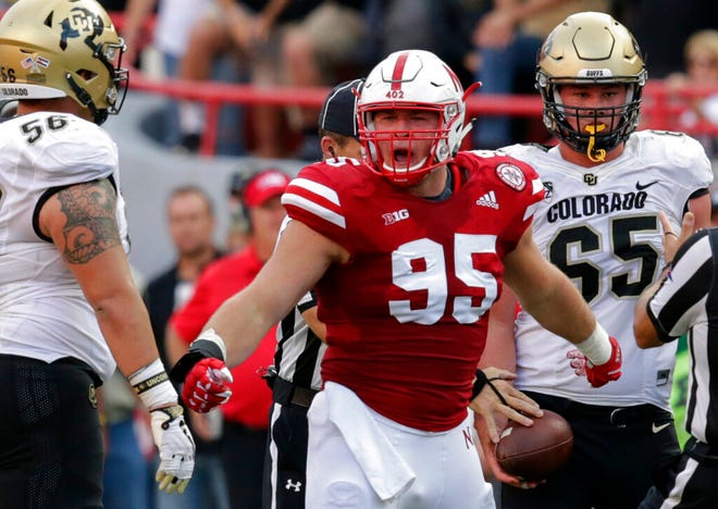From Sept. 8, 2018, Nebraska defensive lineman Ben Stille (95) celebrates a sack of Colorado quarterback Steven Montez during the second half of an NCAA college football game in Lincoln, Neb. The Nebraska defense is counting on Stille and his linemates as the 24th-ranked Cornhuskers try to rebound from a 4-8 record last year. (AP Photo/Nati Harnik, File)