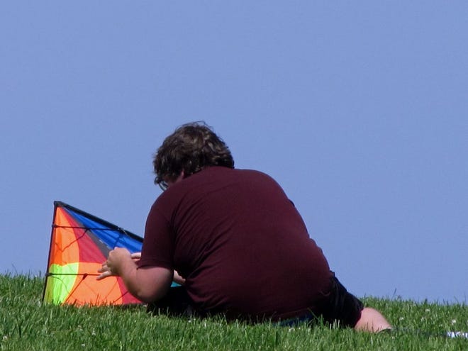 Flying kites at Castle Island is a lot of fun – once they are ready to get into the air.