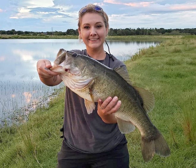 Tracy Davis of Lakeland caught this 6.15 pound bass on a BioSpawn Vilebug creature bait in south Lakeland this week. (Photo provided by: Tracy Davis)