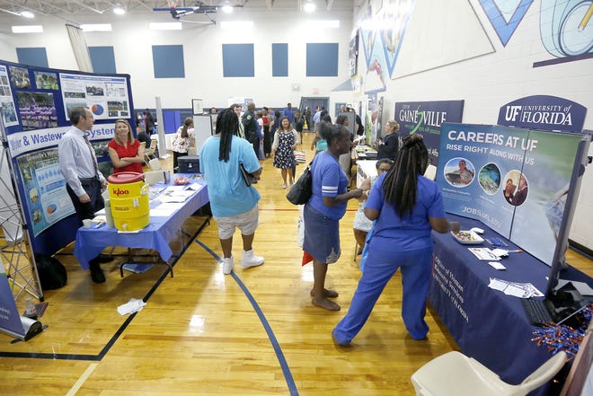 Job seekers and employers meet at the MLK Multi-Purpose Center during the city of Gainesville Office of Equal Opportunity Job Fair in 2016. [FILE PHOTO/SPECIAL TO THE GUARDIAN]