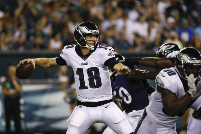 Eagles quarterback Josh McCown looks for a receiver during the first half of Thursday night's preseason game against the Ravens. [MICHAEL PEREZ / ASSOCIATED PRESS]