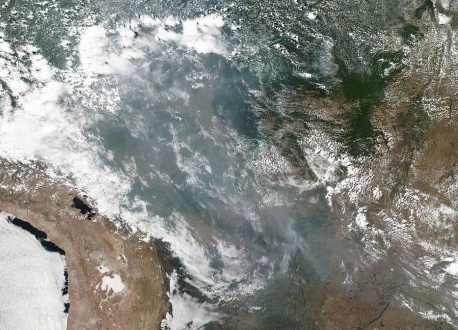 The wildfires in the Amazon rainforest are visible from space, 1,700 miles away. [NASA]