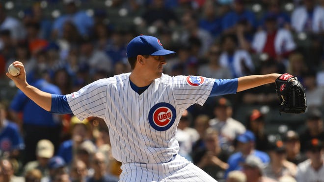 Chicago Cubs starting pitcher Kyle Hendricks (28) delivers during the first inning of Thursday's game against the San Francisco Giants in Chicago. [AP Photo/Matt Marton]