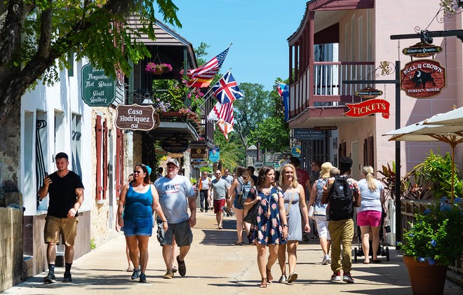 People walk down St. George Street in St. Augustine in 2018. [PETER WILLOTT/THE RECORD]