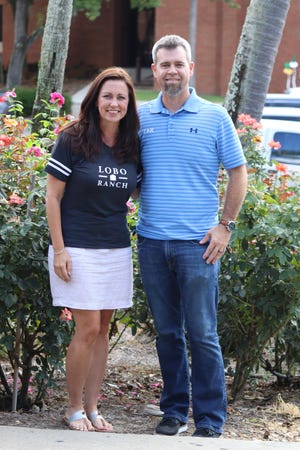 Melissa and Tony Lobozzo, founders of LoBo Ranch, a Lakeland nonprofit that helps reunite siblings separated by foster care. [KATHY LEIGH BERKOWITZ/THE LEDGER]