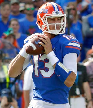 From Oct. 6, 2018, Florida quarterback Feleipe Franks looks for a receiver against LSU during the first half of an NCAA college football game in Gainesville, Fla. Florida and Miami have the college football stage to themselves for 3 Â½ hours Saturday, a new chapter in their once-heated and forever-storied rivalry. (AP Photo/John Raoux, File)