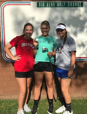 Claymont freshman Alivia Edwards aced the No. 6 hole (130-yard, par 3) using a 9-iron during practice at Big Bend Golf Course in Uhrichsville Friday afternoon with teammates Meg Harmon and Jordan Gibson. Teammates Jocelyn Scalambrino are Emma Woodward are absent from the photo. Submitted photo