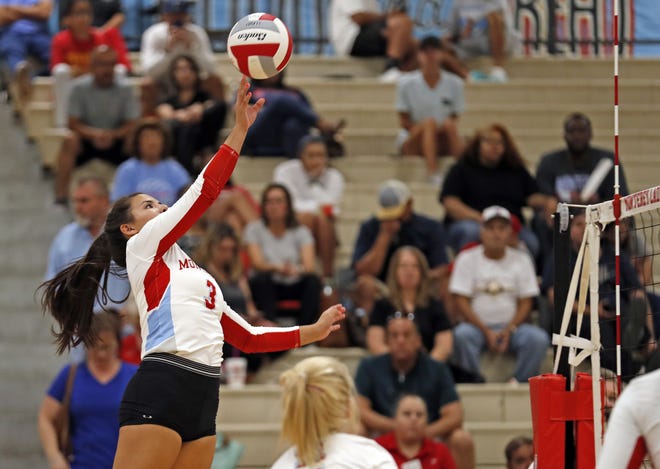 Monterey's Nadia Morales (3) hits the ball over the net during a nondistrict match Aug. 20 against Odessa High at Monterey High School. [Brad Tollefson/A-J Media]