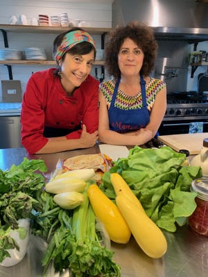 Chef Cathy Vogt in the kitchen of Watergrasshill Bed and Breakfast with assistant for the class, Linda Johnston, at the Summer Taco Party cooking class. [Photo by Claudia Jacobs]