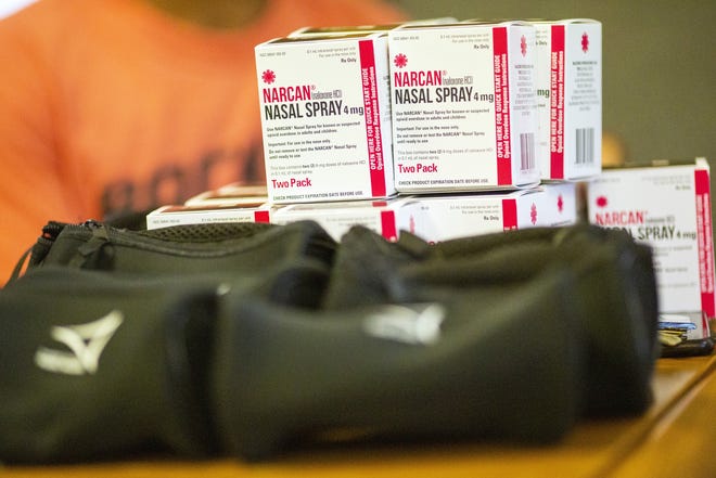 Boxes of Narcan Nasal Spray sit on a table for distribution during a Franklin County Public Health sponsored Naloxone education session titled ‡¨Community Training: Opiate Crisis‡Æ at the Westerville City Hall in Westerville, Ohio on August 12, 2019. The session offered visitors a training on how the Opioid epidemic is being approached by Franklin County and gave visitors two doses of Naloxone to take home in case they witness an overdose. [Brooke LaValley/Dispatch]