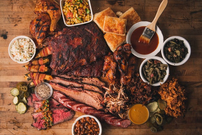 This photo shows an array of smoked meats offered at the 4 Rivers Smokehouse chain. [4 Rivers Smokehouse]