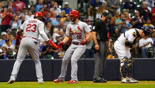 St. Louis Cardinals' Paul DeJong celebrates his two-run home run with Marcell Ozuna (23) during the sixth inning of a baseball game against the Milwaukee Brewers Monday, Aug. 26, 2019, in Milwaukee. (AP Photo/Morry Gash)