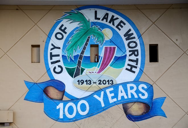 The city seal painted on the bandshell wall in Bryant Park in downtown Lake Worth Beach. [RICHARD GRAULICH / palmbeachpost.com]