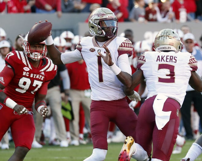 Florida State's James Blackman (1) looks to pass Nov. 3, 2018 during the first half of the team's game against North Carolina State in Raleigh, N.C. Blackman has won the the quarterback competition at FSU. [AP Photo/Chris Seward, File]