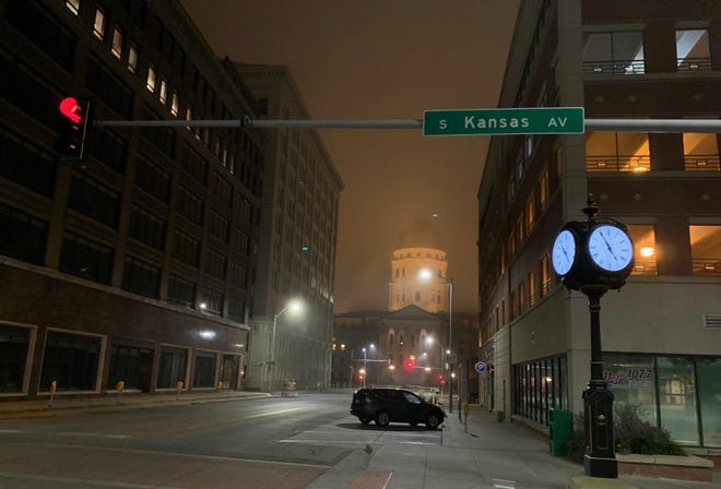 The Statehouse was shrouded in fog early Monday in downtown Topeka. Highs on Monday are expected in the mid-80s with a chance for rain and thunderstorms. [Phil Anderson/The Capital-Journal]