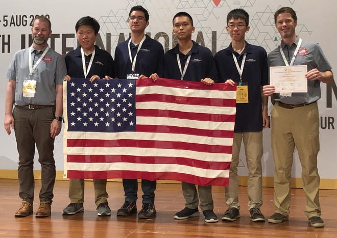 Buchholz High School student Albert Zhang (second from left) is one of four Team USA members and two coaches who participated in the 2019 International Geography Olympiad, or iGeo, held from July 30 – Aug. 5 in Hong Kong. Zhang, who is the only student from Alachua County, was the Grand Champion who helped Team USA place second overall. Team USA (from left) Coach Jason Flowers of Texas, Albert Zhang, Elys Anaya of Florida, Kevin Lu of Maryland, Daniel Ma of New York, and coach Steve Muench of New Jersey. (SUBMITTED PHOTO)