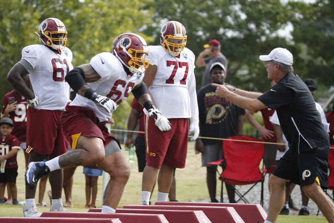 Now 27 months removed from a painful decision similar to what former teammate Andrew Luck made last week, Washington Redskins OL Hugh Thornton (69) is attempting to complete an NFL comeback with the Redskins that would be a major milestone in a lifelong journey full of adversity. [AP PHOTO/STEVEL HELBER, FILE]