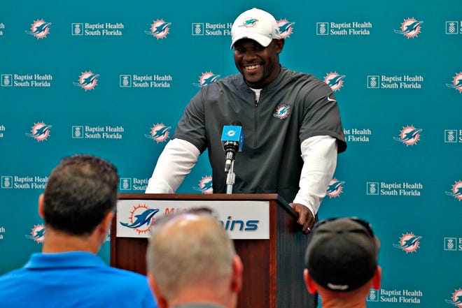 Miami Dolphins head coach Brian Flores takes questions from members of the media [CARL JUSTE/AP]