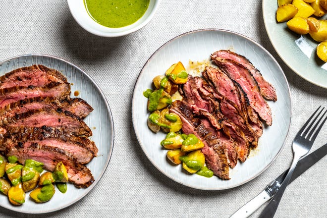 Cumin-Rubbed Flank Steak With Chimichurri Potatoes can be cooked inside or out.

[Laura Chase de Formigny/For The Washington Post]