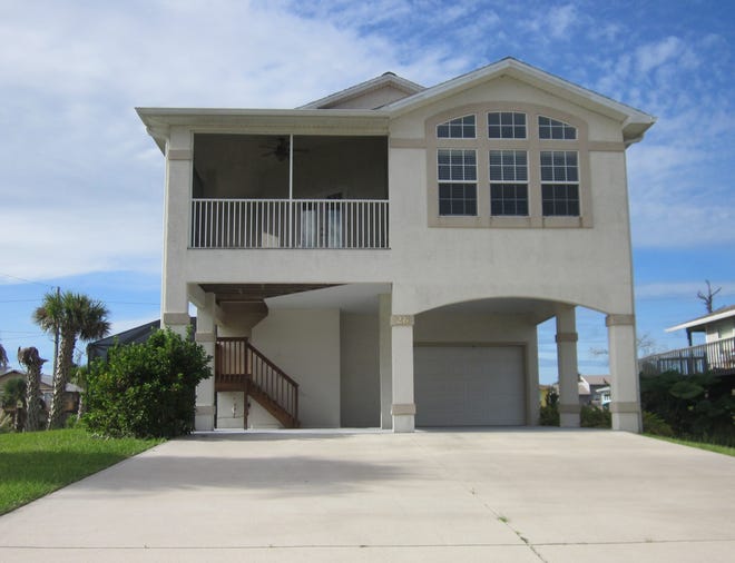 This house on Moody Drive, built in 2008 two blocks from the beach, has three bedrooms and three baths in 2,041 square feet of living space. It also has a screened solar-heated saltwater pool, an elevator, a gas fireplace, a screened balcony and an outdoor shower. It sold recently for $431,000.