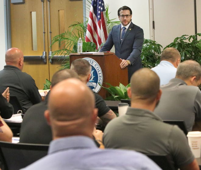 Andrew Urbanak, assistant state attorney 7th circuit, speaks Wednesday to police officers at the 12th annual Detectives Academy. More than 300 detectives have taken the course over the years. [News-Journal/David Tucker]
