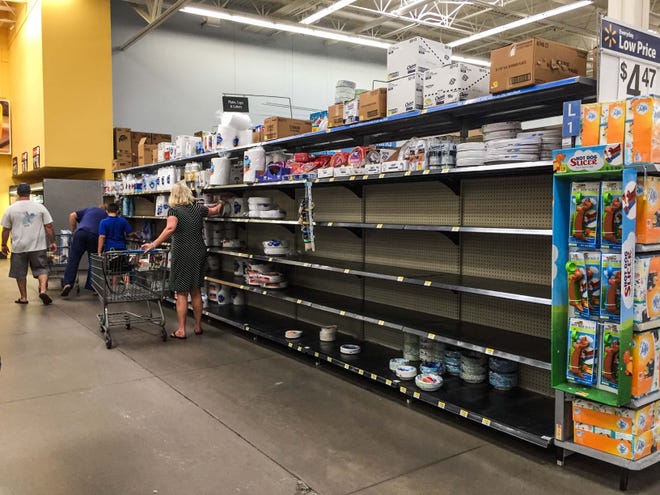 Stocking up for Hurricane Dorian? Don't forget to stock up on information, too. [News-Journal / LOLA GOMEZ]